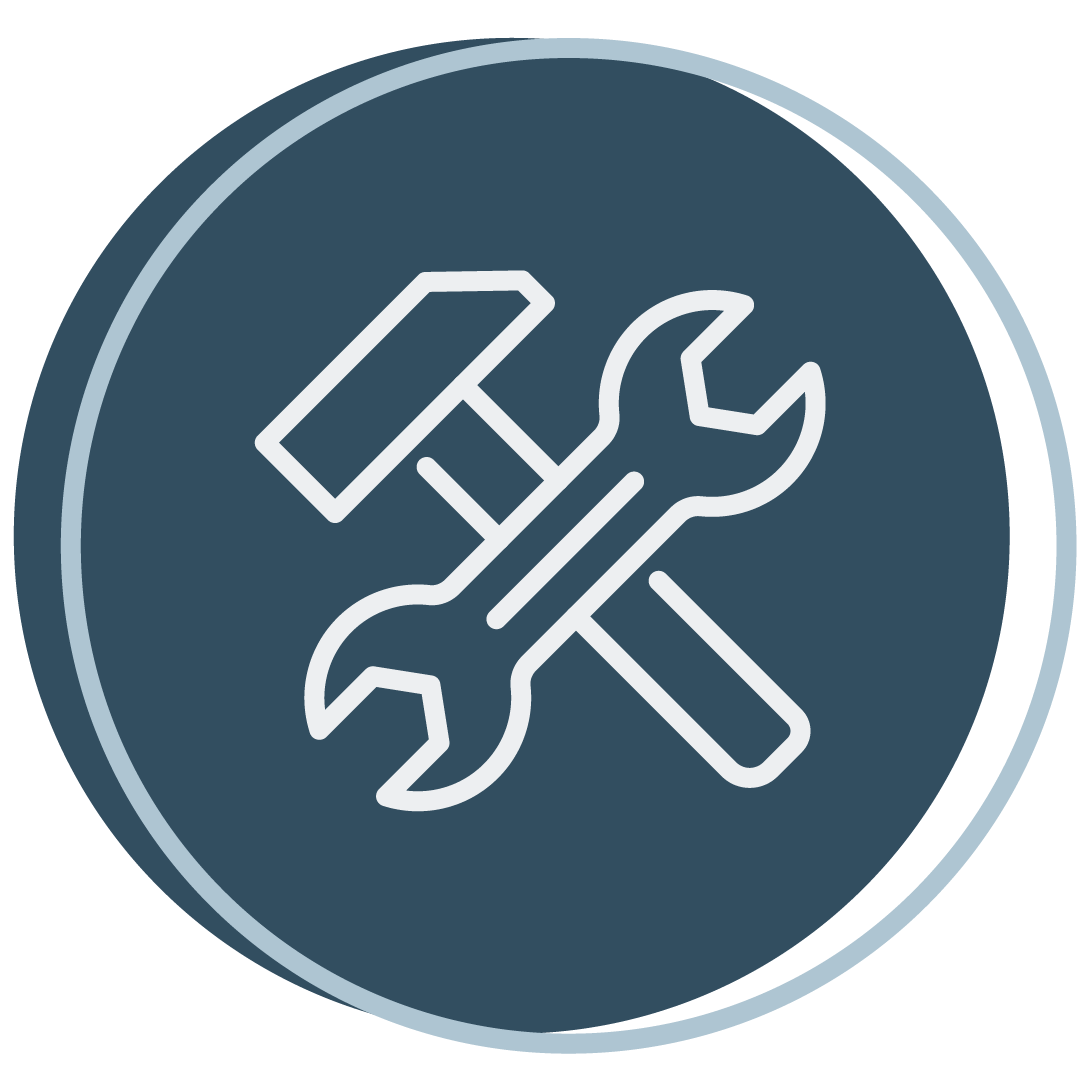 Icon of a hammer and wrench crossed over a dark circular background.